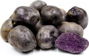 A grouping of purple potatoes