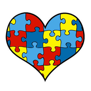 A heart, made up of various colored puzzle pieces