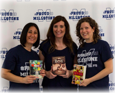 3 women holding their books that they wrote