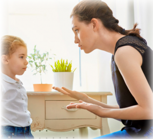 A mom seemingly lecturing her child