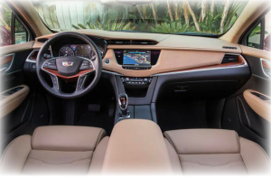 The interior of a Cadillac car with tan leather