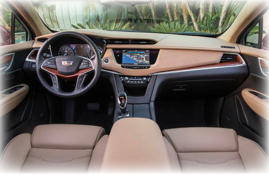 The interior of a Cadillac car with tan leather