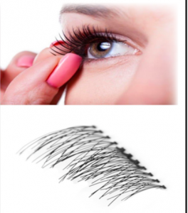 A lady taking off her magnetic eye lashes, with some lashes visible in the bottom frame