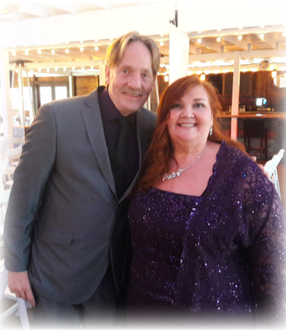 A photo of a man and a women standing together at an event