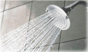 A shower head with water streaming down