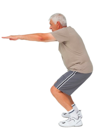 An older man, doing some bodyweight squats for muscle strength