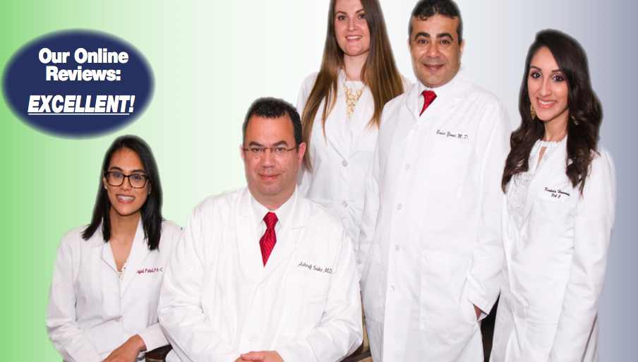 A grouping of doctors sitting together in their doctors coats