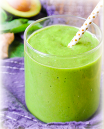 Banana, Ginger, and Avocado Smoothie with a spotted straw in it