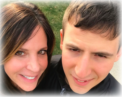 Joy & Jake standing close to each other for a selfie