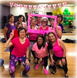 Women gathering together to raise awareness about breast cancer