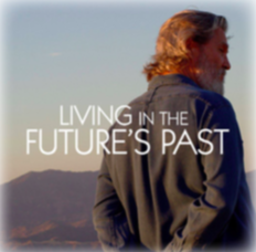 A man standing on a mountain range with words overlaid that say living in the futures past