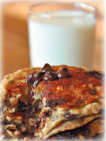 Chocolate Oatmeal Pancakes, with a glass of milk in the background