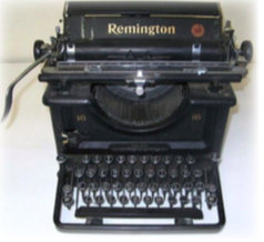 A very old style type writing machine