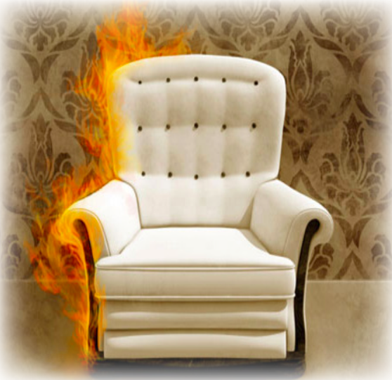 A chair that is half on fire, with a decadent wallpaper in the background