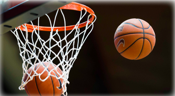 A basketball Flying through the hoop and another one in the air