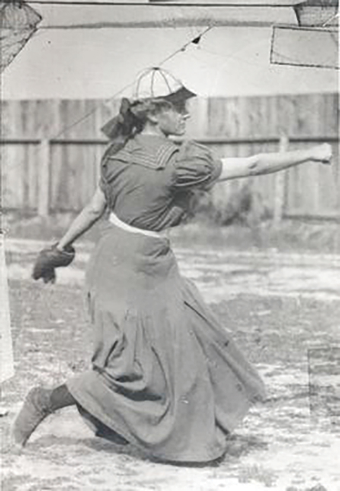 A black and white image of Alta Weiss mid throw in sport